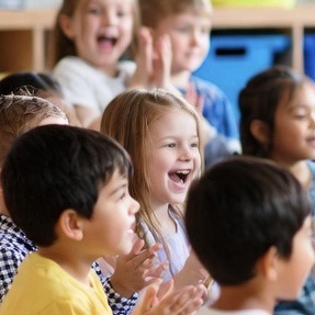 Children listening to a teacher read